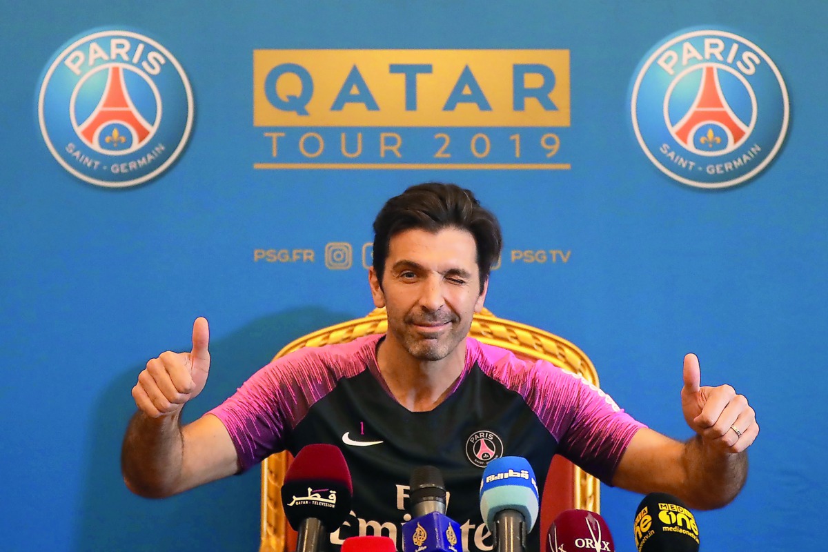 PSG’s Italian goalkeeper Gianluigi Buffon gives the thumbs up as he attends a press conference in Doha, yesterday.