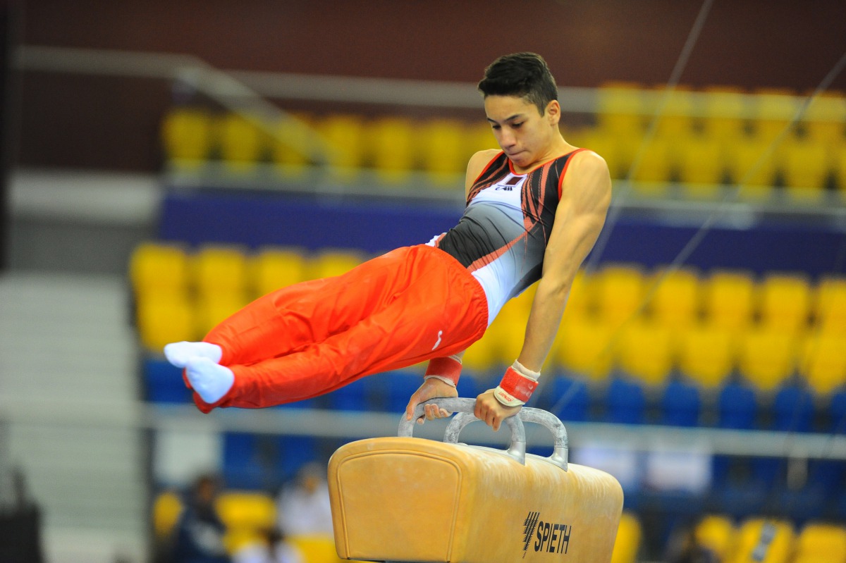 Qatari teenager Raslen Saoud in action in yesterday’s qualifying round of the pommel horse during the opening day of the FIG ART Individual Apparatus World Cup at Aspire Dome in Doha. 
PICTURES: WASFY