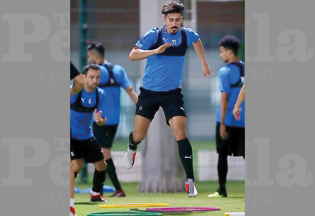 Al Sadd’s Baghdad Bounedjah trains with team-mates on the eve of their QNB Stars League Round 22 match against Umm Salal, which will be played at the Al Sadd Stadium today. 