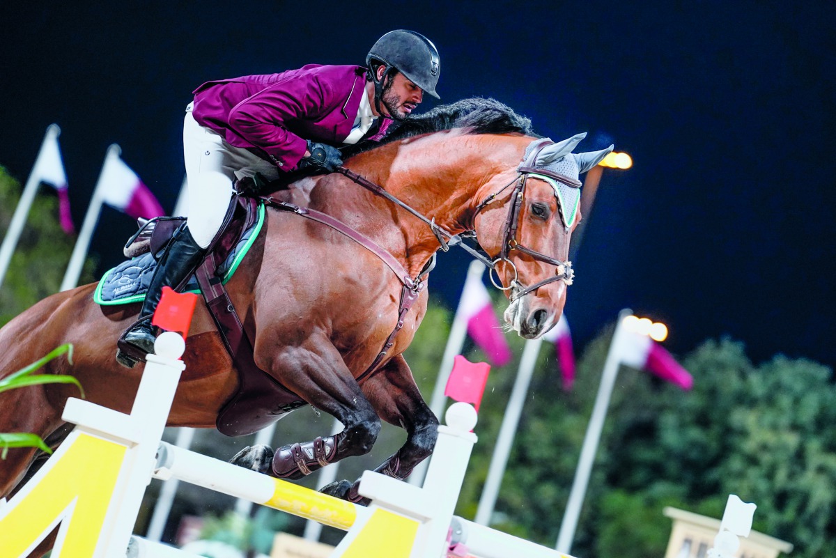 Nasser Al Ghazali guides Aslan 69 over an obstacle.