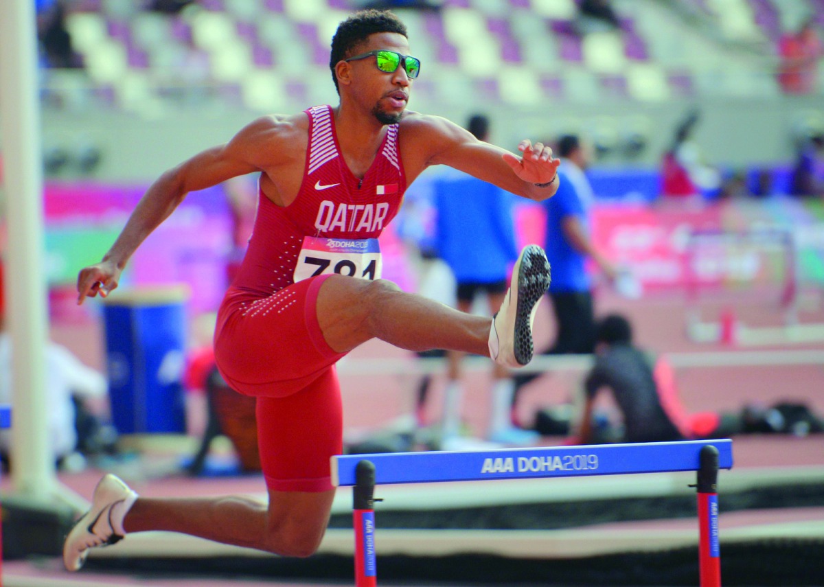 Qatar’s Abderrahman Samba in action during the Asian Athletics Championships men’s 400m hurdles at the Khalifa International Stadium in Doha yesterday.  Pictures: Baher Amin/The Peninsula
