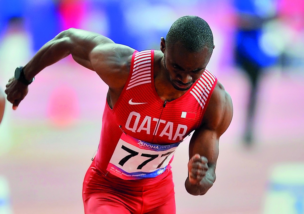 Qatar’s Femi Ogunode in action during the semi-final of the men’s 200 metres on the third day of the 23rd Asian Athletics Championships at the Khalifa International Stadium in Doha, yesterday. 
Pics: Baher Amin / The Peninsula  