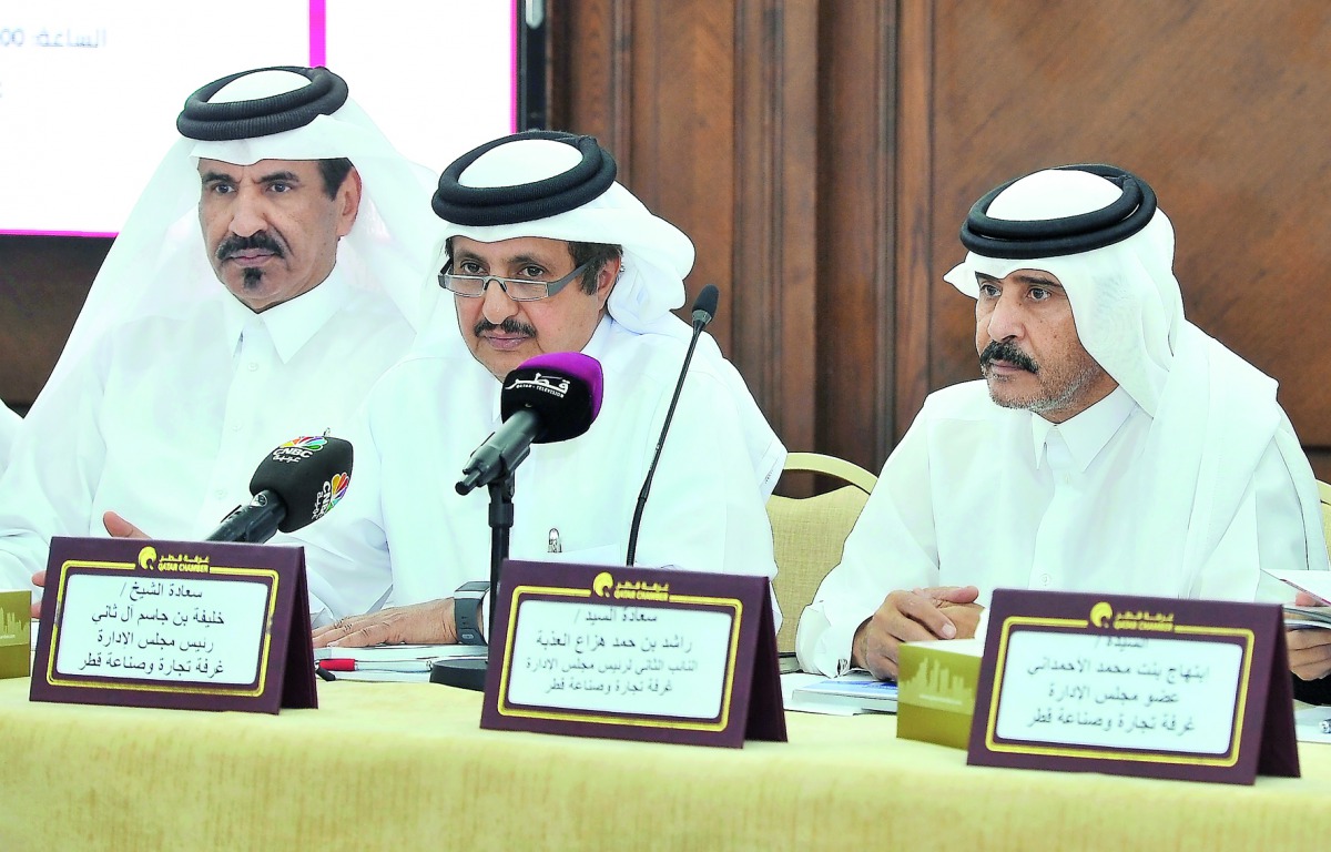 Sheikh Khalifa bin Jassem bin Mohammed Al Thani (centre), Chairman of Qatar Chamber (QC); Mohamed bin Ahmed bin Towar Al Kuwari (left), QC First Vice-Chairman, and Rashid Hamad Hazza Al Athba, Second Vice-Chairman with other board members (not in the pict