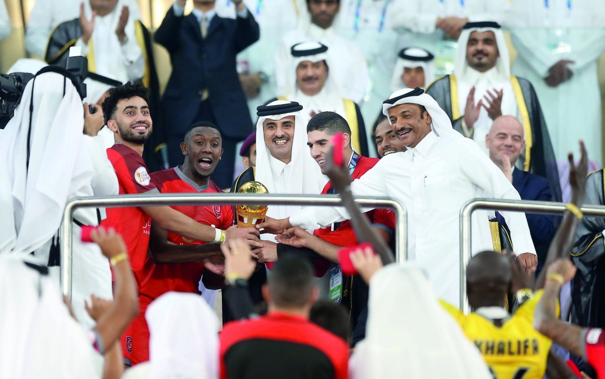 Amir H H Sheikh Tamim bin Hamad Al Thani yesterday crowned Al Duhail club, winners of H H the Amir Football Cup, after they beat Al Sadd 4-1 in the final match held at Al Janoub Stadium. 