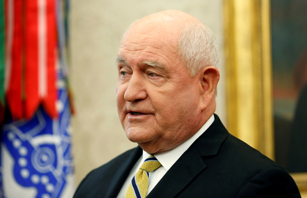 US Secretary of Agriculture Sonny Perdue speaks during an event hosted by US President Donald Trump with workers on 