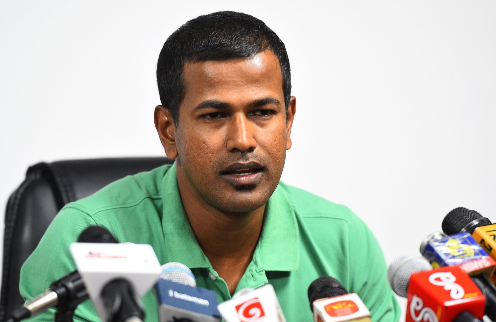 Sri Lankan cricketer Nuwan Kulasekara speaks during a press conference in Colombo on July 24, 2019. / AFP / ISHARA S. KODIKARA