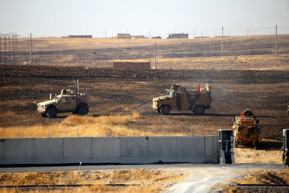 The Turkish and U.S. armed forces start their second joint land patrol for a planned safe zone east of the Euphrates River in northern Syria, in Sanliurfa, Turkey on September 24, 2019. Mehmet Fatih Aslan - Anadolu