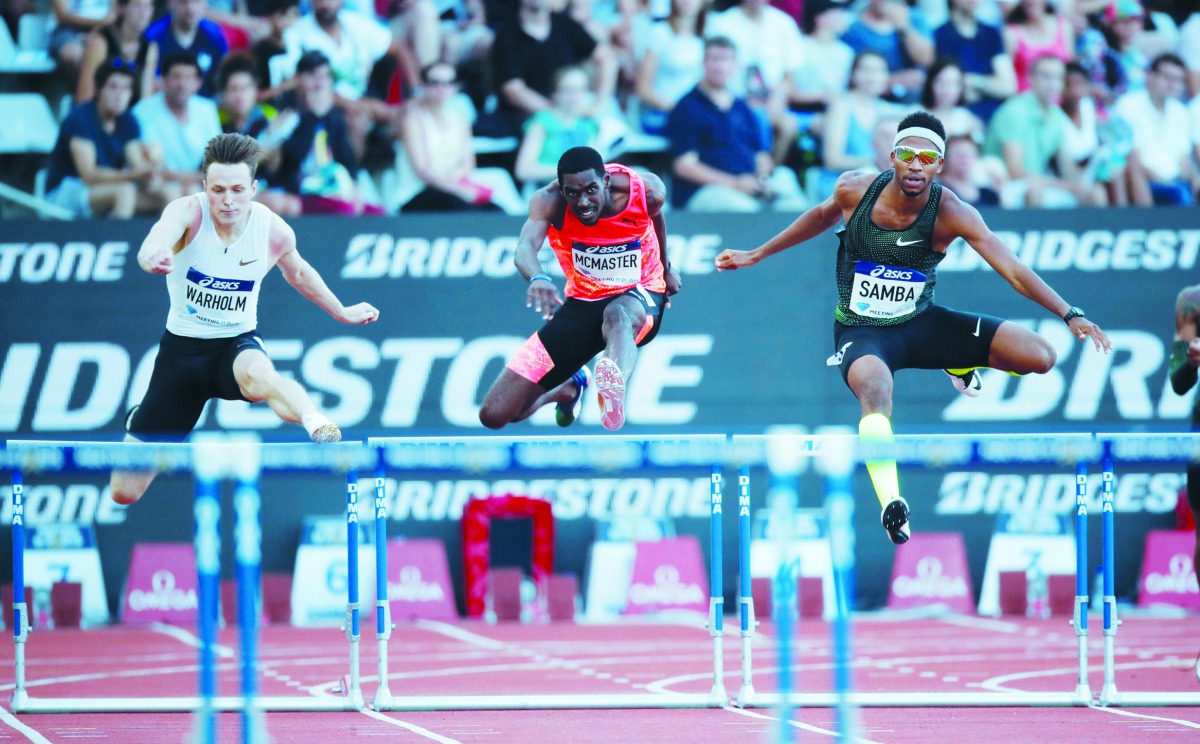 Qatar’s Abderrahman Samba (right) on his way to win the 400m hurdles, ahead of British Virgin Islands’ Kyron McMaster and Norway’s Karsten Warholm (left) in Paris, in this June 30, 2018, file photo.