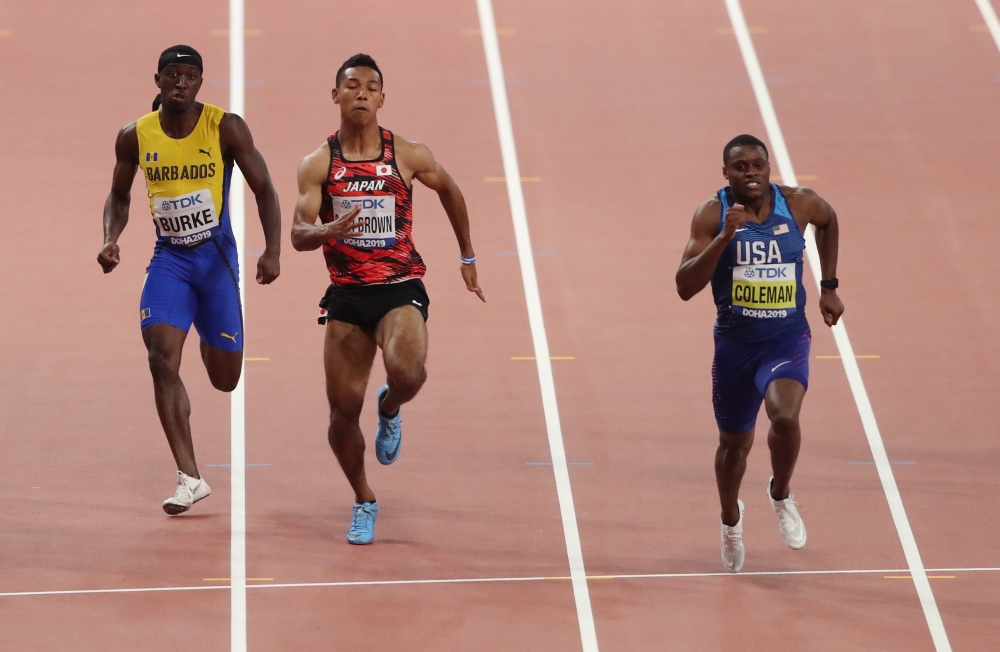 Christian Coleman of the US in action with Abdul Hakim Sani Brown of Japan and Mario Burke of Barbados. (Reuters Ahmed Jadallah) 