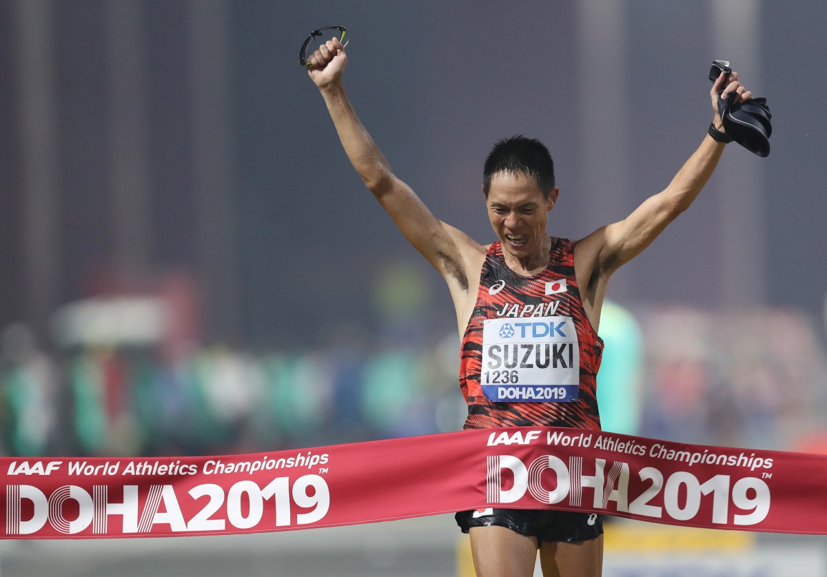 Japan’s Yusuke Suzuki crossing the finish line to win the men’s race walk gold. 