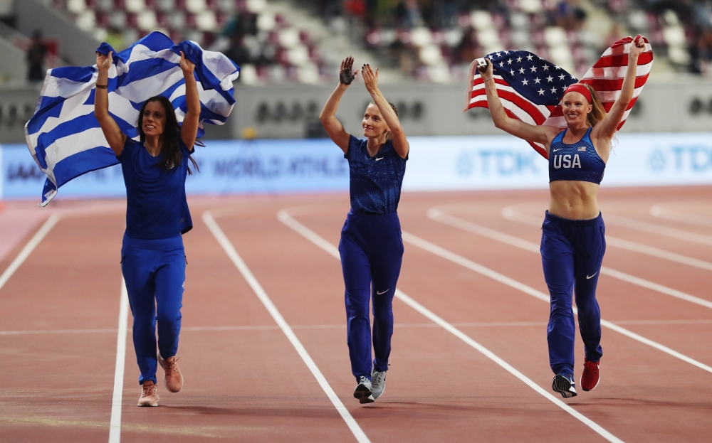 Sandi Morris of the U.S., Greece's Katerina Stefanidi and Neutral athlete Anzhelika Sidorova celebrate their winning REUTERS/Aleksandra Szmigiel
 