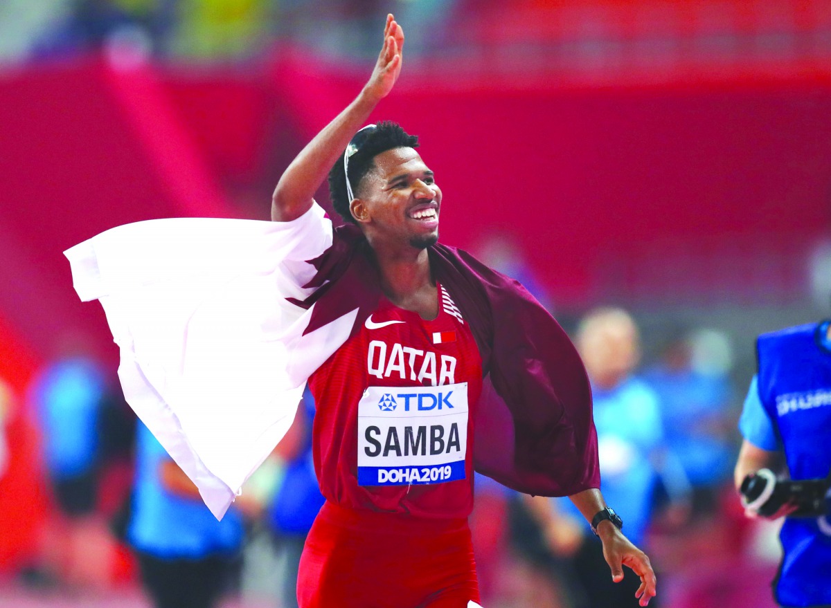 Qatar’s Abderrahman Samba celebrates after winning the bronze medal in the men’s 400 metres hurdles final on Monday. 