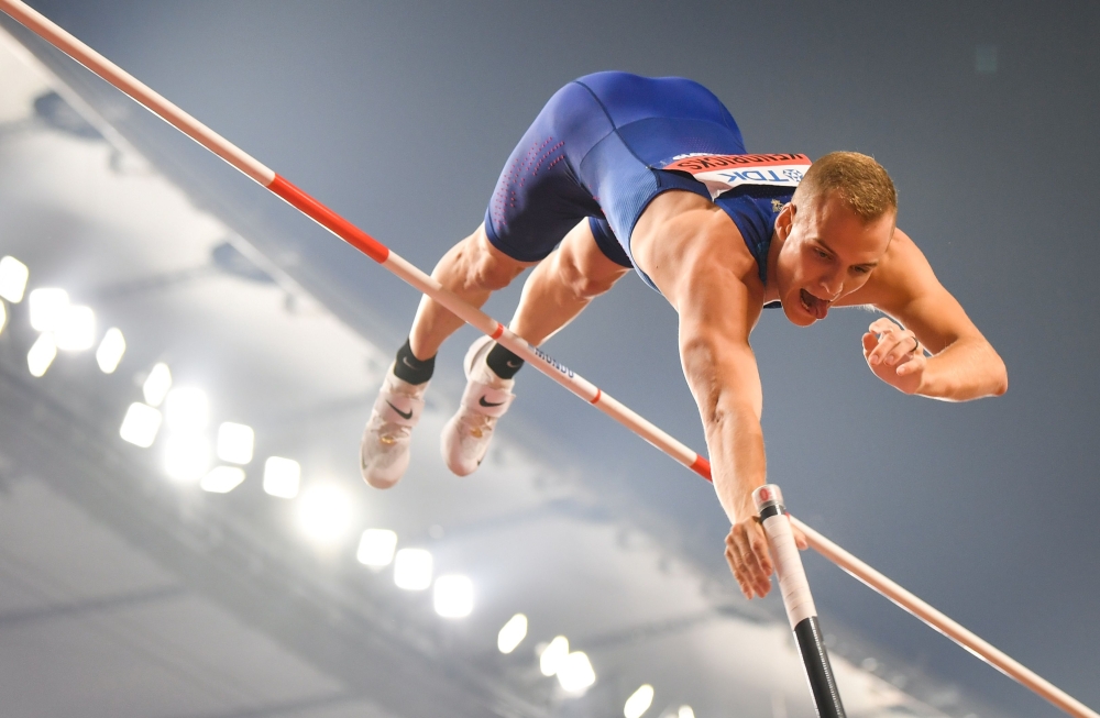 USA's Sam Kendricks competes in the Men's Pole Vault final at the 2019 IAAF Athletics World Championships at the Khalifa International stadium in Doha on October 1, 2019. / AFP / ANDREJ ISAKOVIC