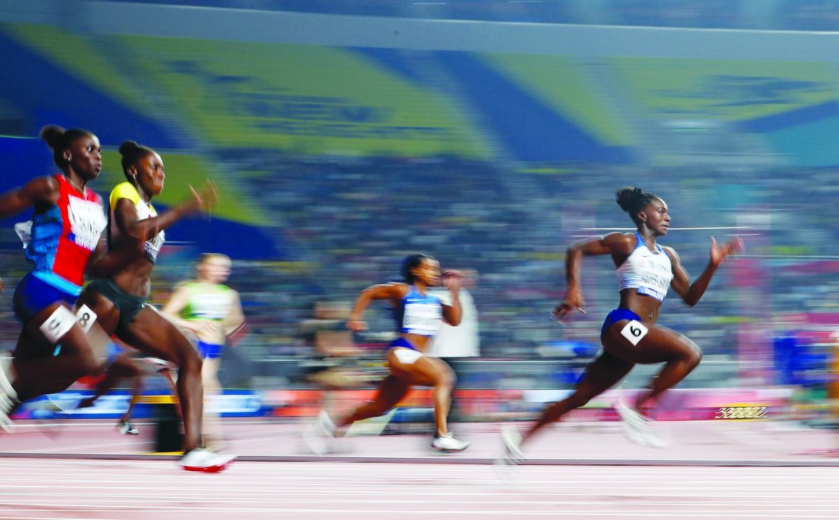 Great Britain’s Dina Asher-Smith (right) on her way to win the gold medal in the women’s 200 metres final on the sixth day of the IAAF World Athletics Championships at the Khalifa International Stadium in Doha, yesterday.