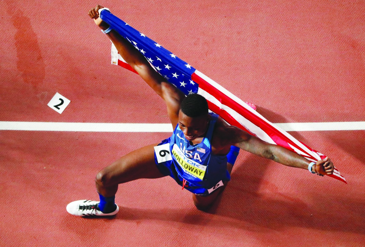 Grant Holloway of the US celebrates after winning gold medal.