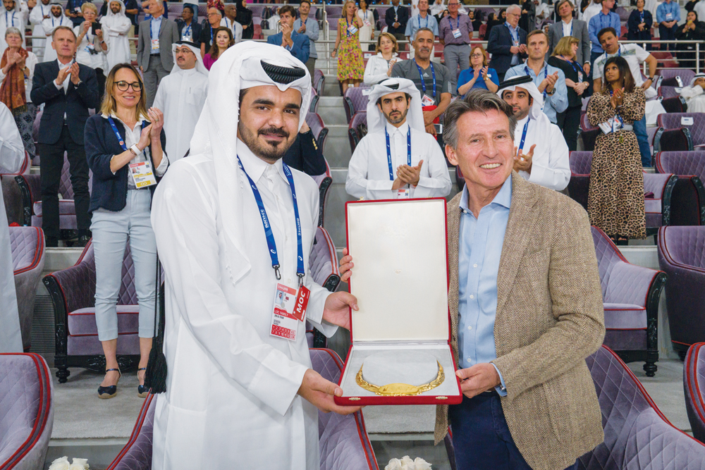 On behalf of H H the Amir, President of Qatar Olympic Committee, and Chairman of the World Athletics Championships Organising Committee, H E Sheikh Joaan bin Hamad Al Thani, receiving the IAAF Golden Order of Merit from the President of the International 