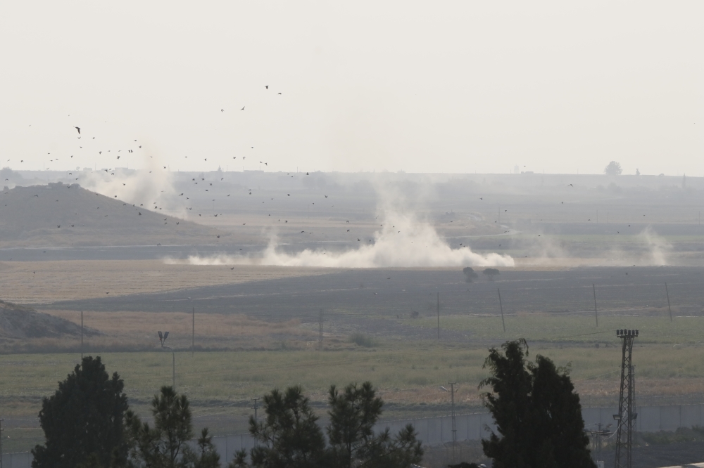 Smoke rises at the site as Turkish troops along with the Syrian National Army begin Operation Peace Spring in northern Syria against PKK/YPG, Daesh terrorists, in Sanliurfa, Turkey on October 09, 2019. ( E?ber Ayayd?n - Anadolu