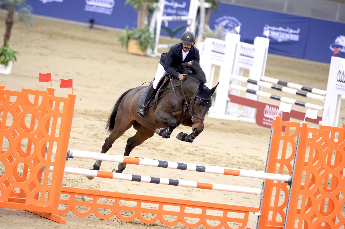 Hamad Nasser Al Qadi guiding Hugo Z over a hurdle during the Small Tour competition yesterday. 	