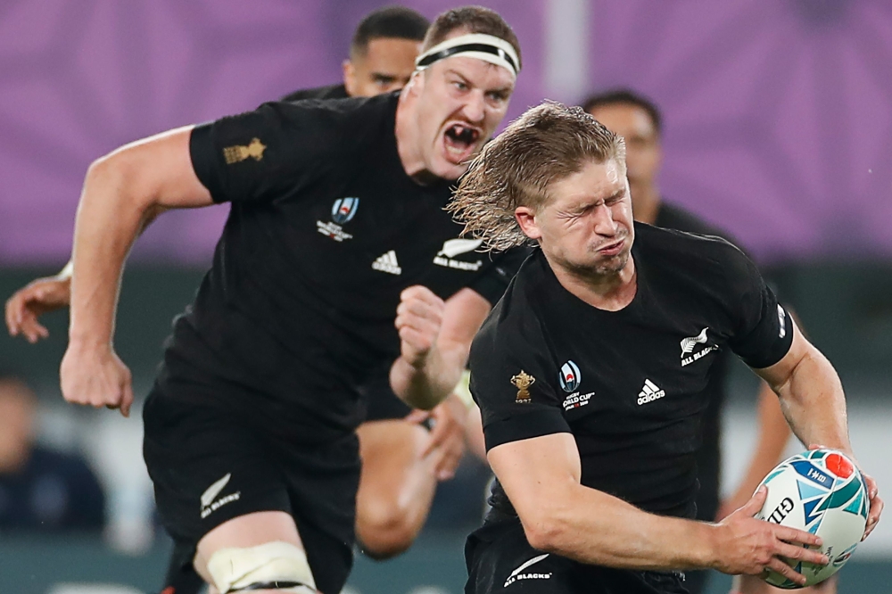 New Zealand's centre Jack Goodhue (R) carries the ball during the Japan 2019 Rugby World Cup quarter-final match between New Zealand and Ireland at the Tokyo Stadium in Tokyo on October 19, 2019. AFP / Odd Andersen 