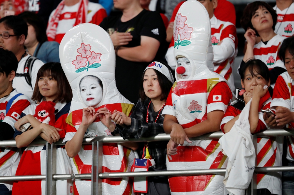 Japan fans after the match REUTERS/Issei Kato