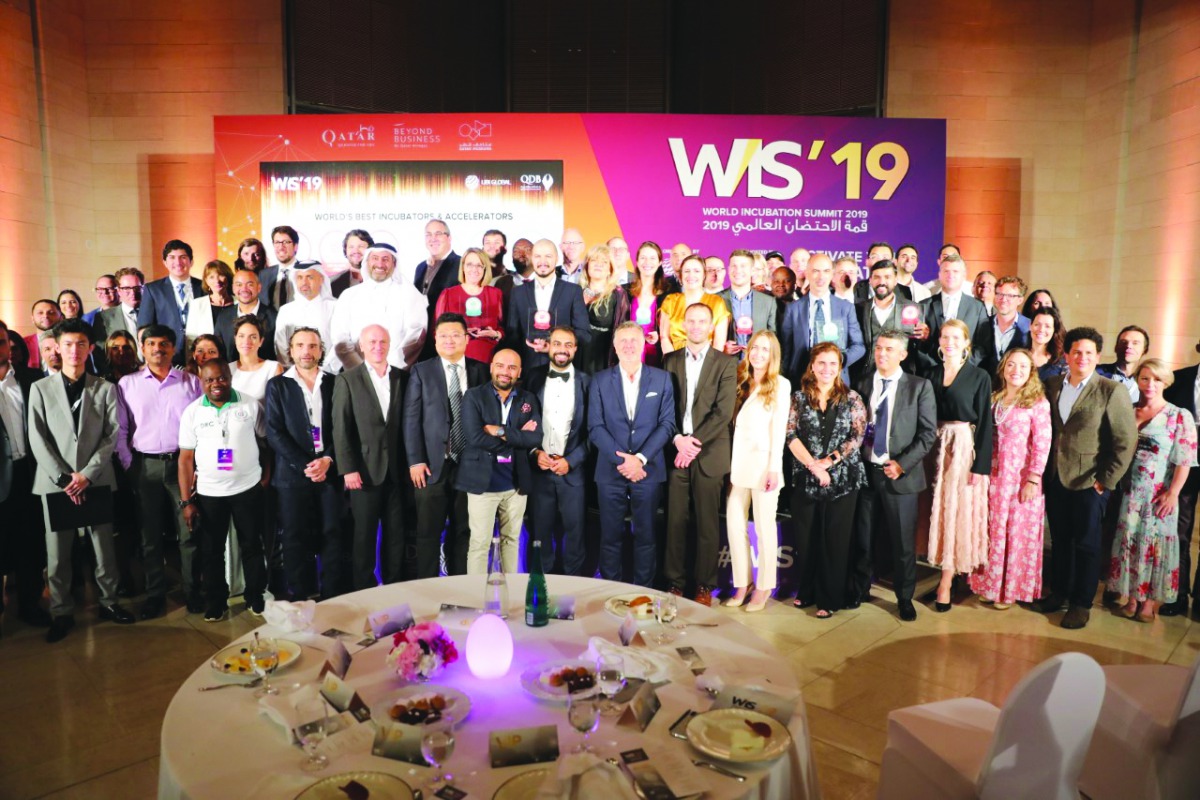 Qatar Development Bank Executive Director of Advisory & Incubation Ibrahim Al Mannai and UBI Global CEO and Co-Founder Ali Amin, with the winners of the World Benchmark Study 2019-2020, and participants of the World Incubation Summit 2019 at the Museum of