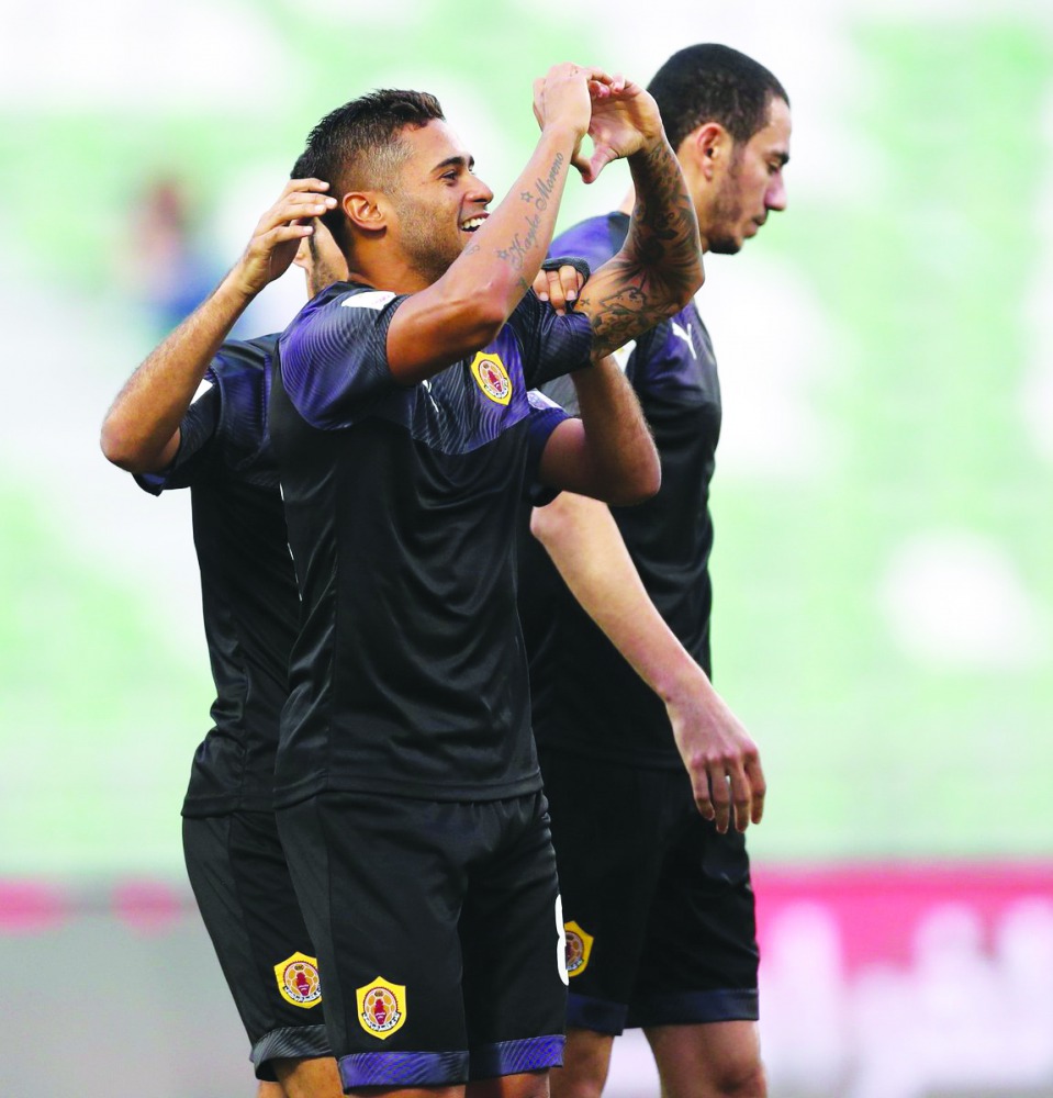 Qatar SC’s Kayke Rodrigues (centre), celebrates after scoring a hat-trick against Al Gharafa in Round 2. 