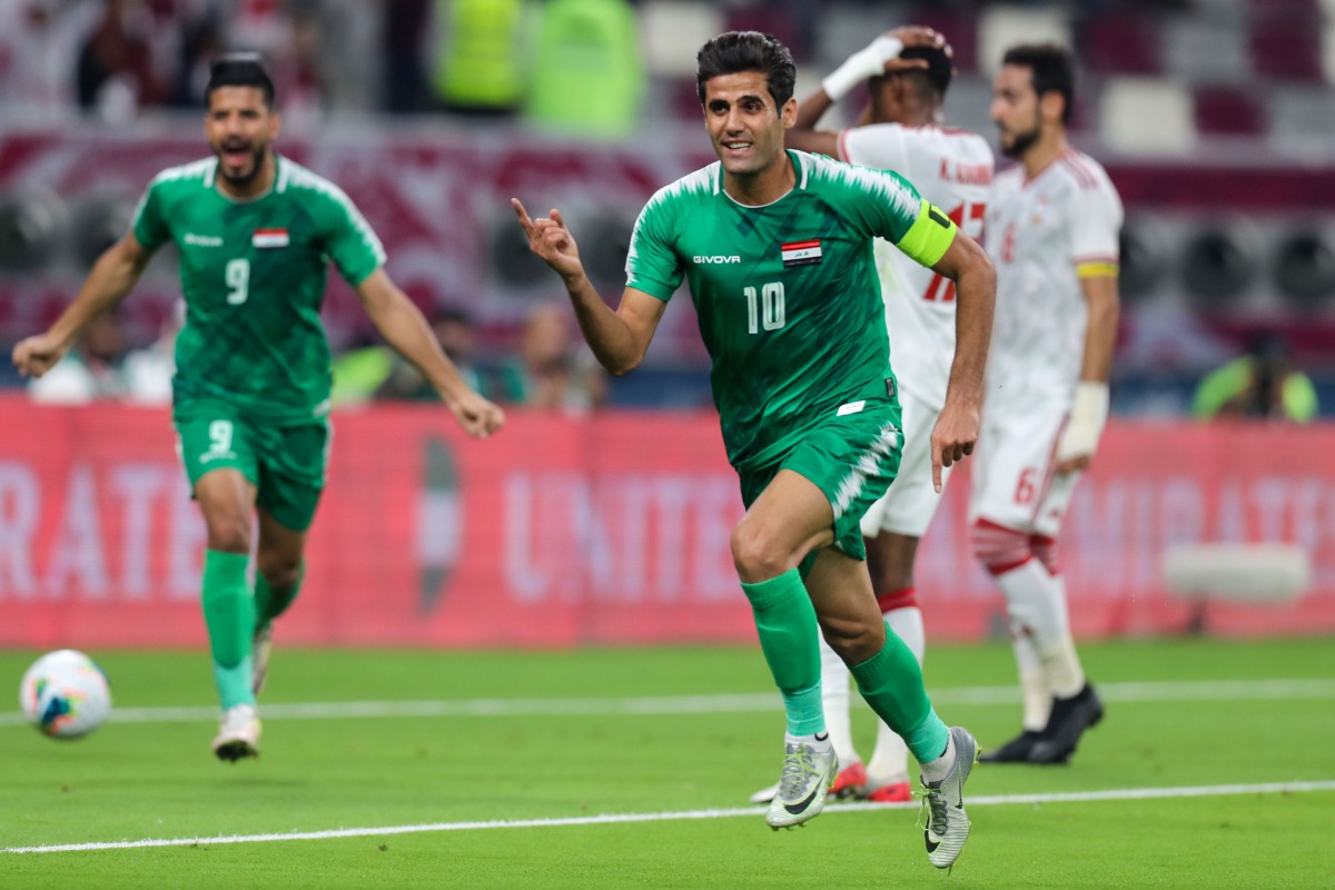 Iraqi forward Alaa Abdul-Zahra celebrates after scoring  against United Arab Emirates during the 24th Arabian Gulf Cup Group A match at the Khalifa International Stadium in  Doha, yesterday.