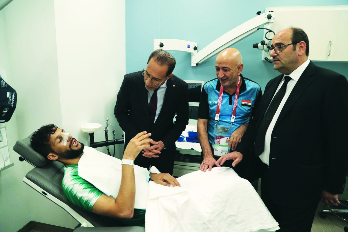 Iraq’s officials speak to defender Saad Al Natiq, who underwent a nose surgery at the Hamad Medical Corporation. Al Natiq, who suffered injury during the UAE match will miss the rest of 24th Arabian Gulf Cup. 