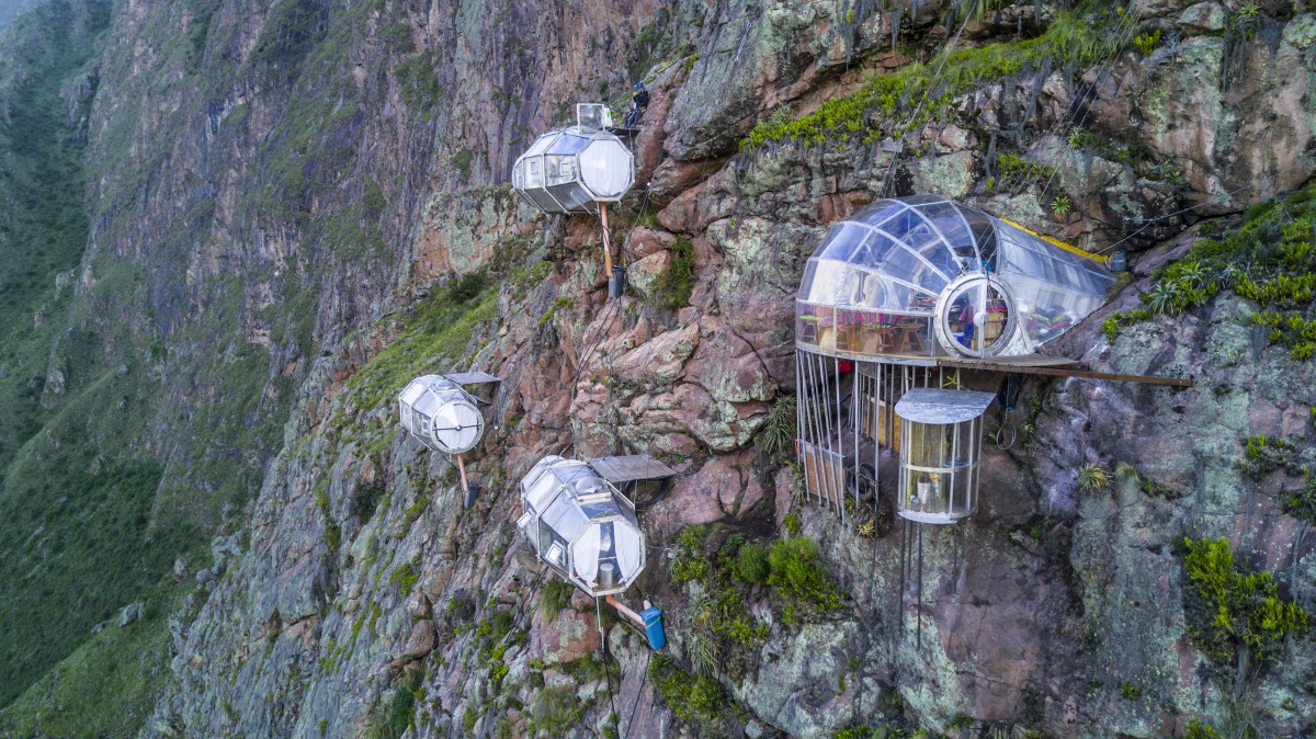 Skylodge Adventure Suites is made up of clear pods hanging above the Sacred Valley in Cusco, Peru. Credit: Natura Vive
