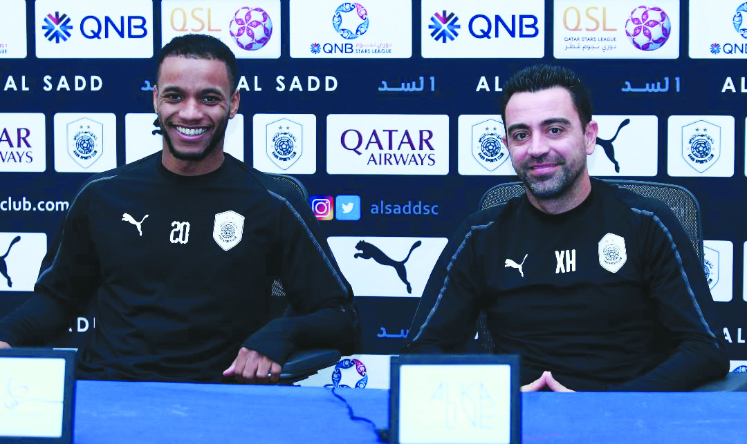 Al Sadd coach Xavi Hernandez (right) and midfielder Salem Al Hajri during a press conference yesterday, ahead of their QSL match against Al Khor. The game will kick off at 7pm.