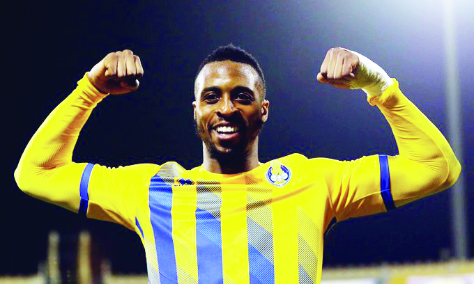 Al Gharafa's Jonathan Kodjia celebrates after completing his hat-trick against Al Rayyan yesterday.  