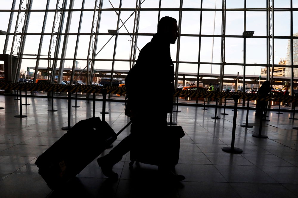 International travelers arrive at John F Kennedy international airport in New York City, February 4, 2017. Reuters / Brendan McDermid