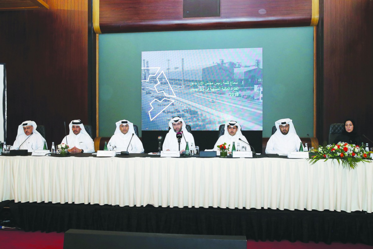 Qamco Chairman Abdulrahman Ahmad Al Shaibi (centre), with other officials, addressing the company’s annual general assembly meeting at the Sheraton Doha Hotel yesterday. 