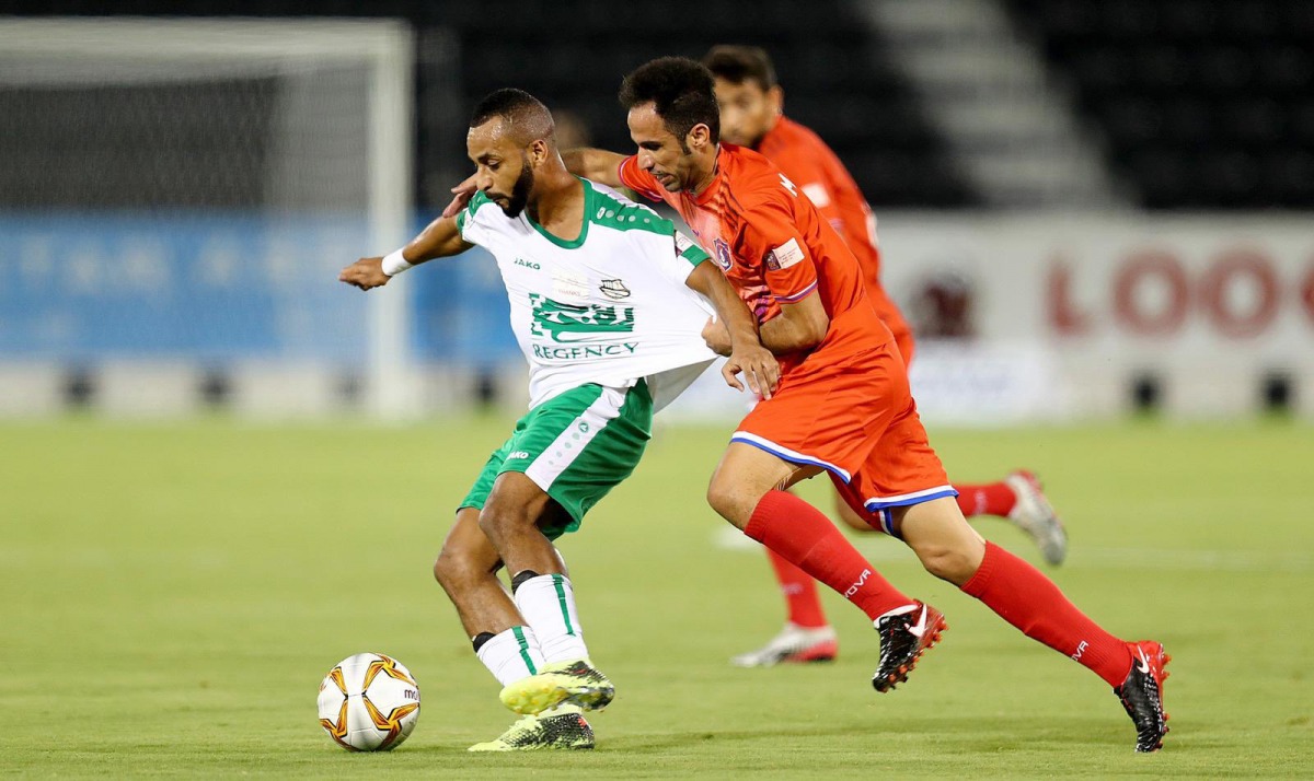 Players vie for the ball during the QNB Stars Legague match between Al Shahania and Al Ahli at Al Sadd Stadium yesterday. 