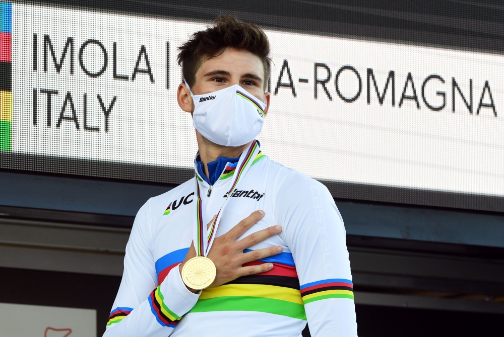 September 25, 2020 Italy's Filippo Ganna celebrates on the podium after winning the men's elite individual time trial REUTERS/Jennifer Lorenzini