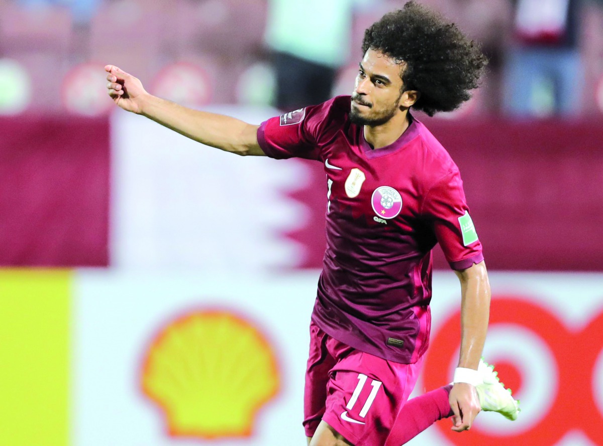 Qatar's Akram Afif celebrates after scoring his second goal against Bangladesh yesterday.