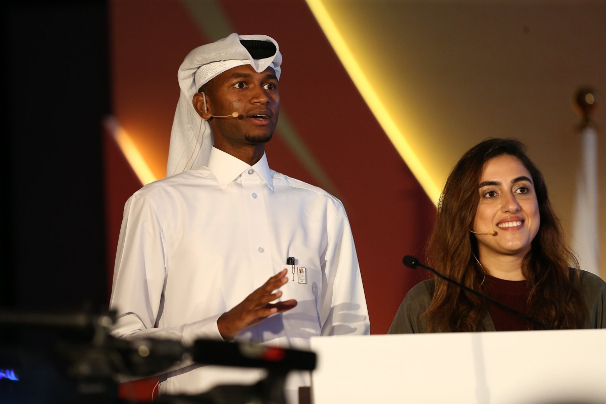 Qatar's high jump world champion Mutaz Essa Barshim and double Olympian Nada Arkaji  during yesterday's 39th General Assembly of the Olympic Council of Asia.