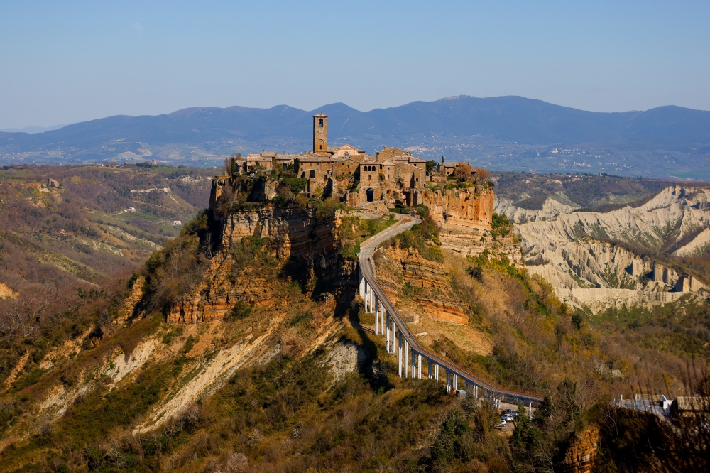 General view of Civita di Bagnoregio, accessible only by a bridge and known as 'the dying town', Italy, March 24, 2021.Reuters/Guglielmo Mangiapane