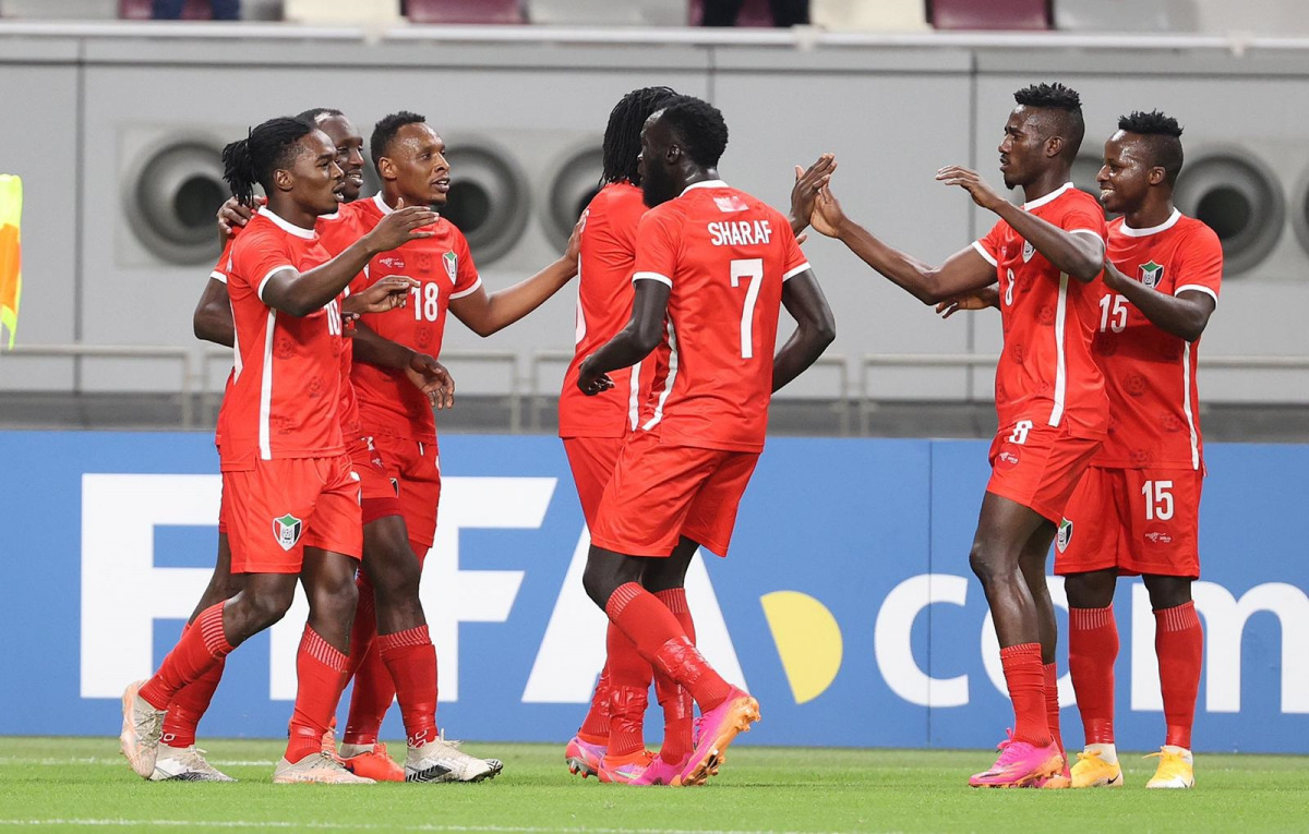 Sudan players celebrate their victory against Libya yesterday.  