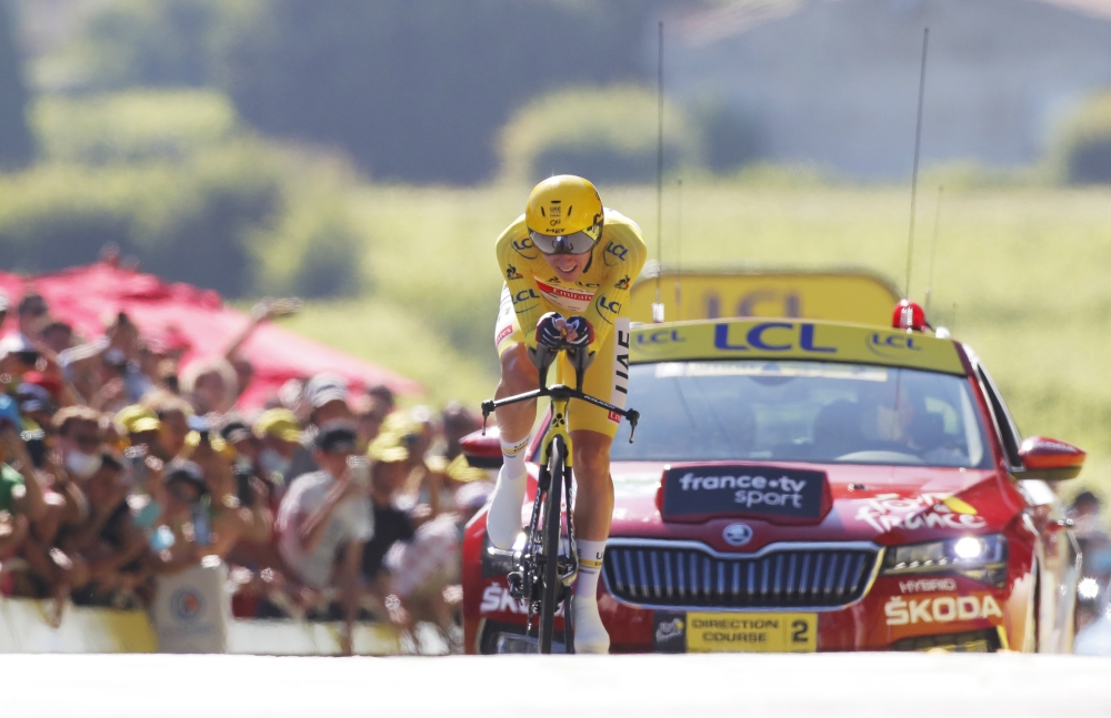 Tadej Pogacar of Slovenia wearing the yellow jersey in action during stage 20 (Reuters/Stephane Mahe)