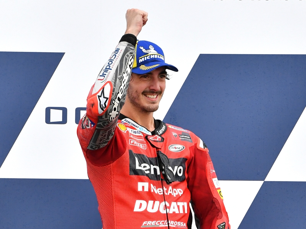 September 19, 2021 Ducati Lenovo Team's Francesco Bagnaia celebrates on the podium after winning the MotoGP race REUTERS/Jennifer Lorenzini