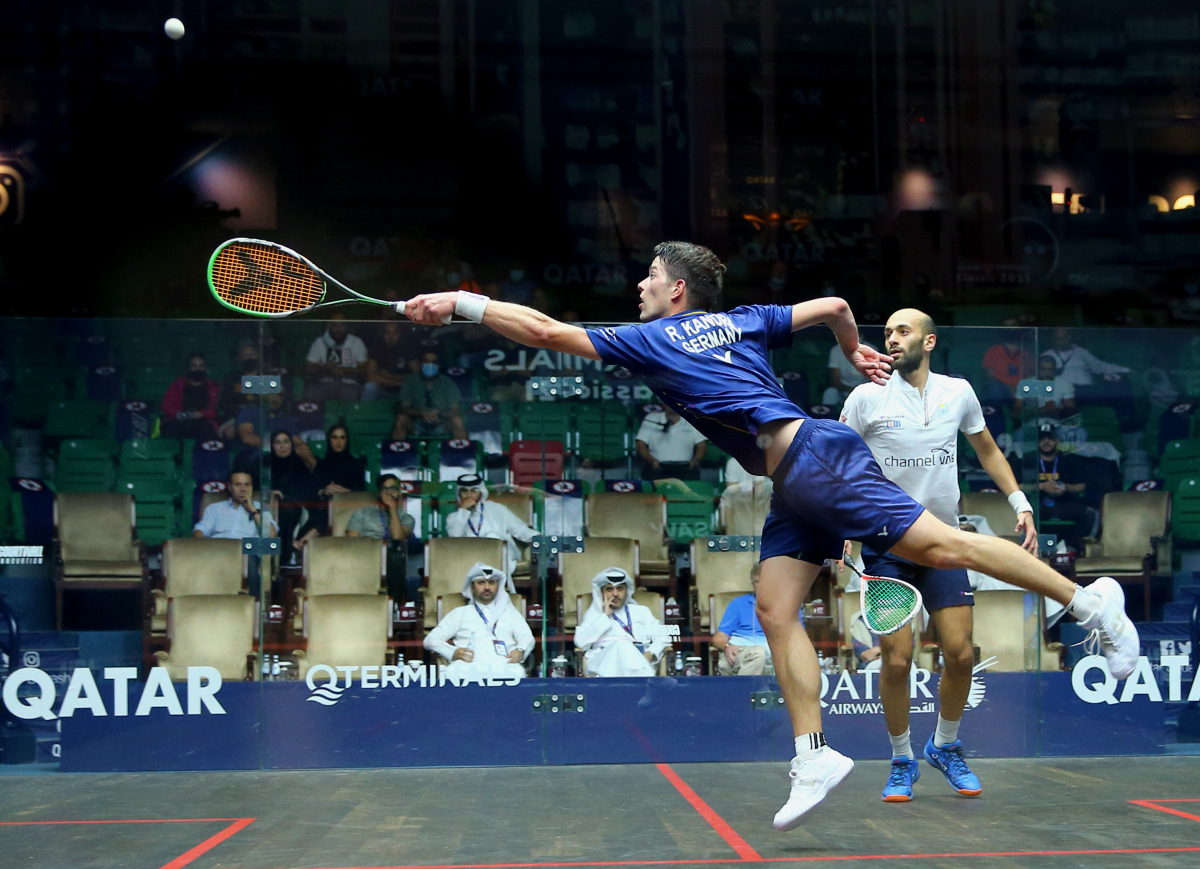 Germany's Raphael Kandra leaps to hit a shot against World No.5 Marwan ElShorbagy during their last 16 clash of the Qatar QTerminals Classic at the Khalifa International Tennis and Squash Complex, yesterday.