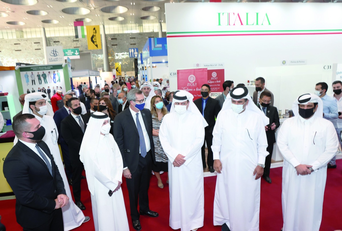 Italian Ambassador to Qatar H E Alessandro Prunas showcasing the Italian pavilion to Qatari officials during the opening of Hospitality Qatar 2021 yesterday. 