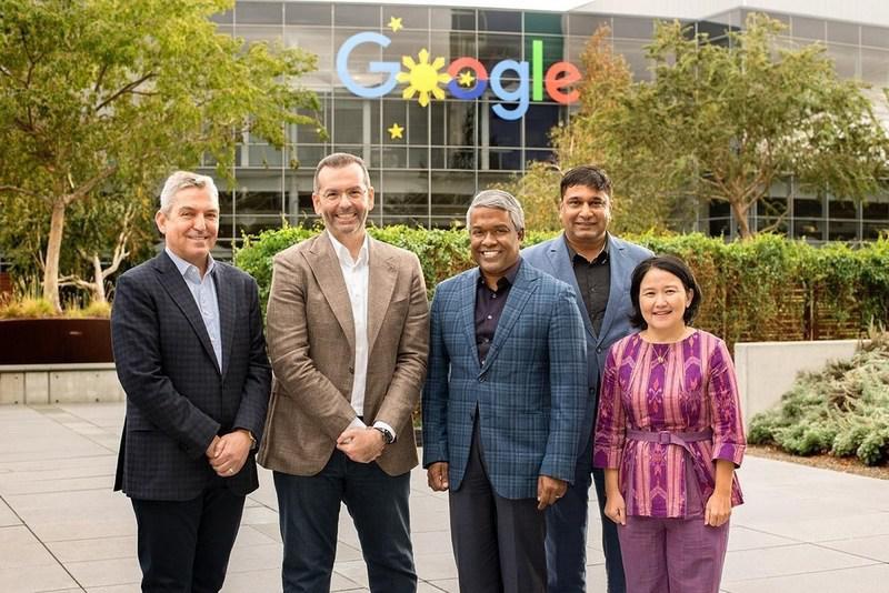 Indosat Ooredoo and Google officials pose for a group photo.