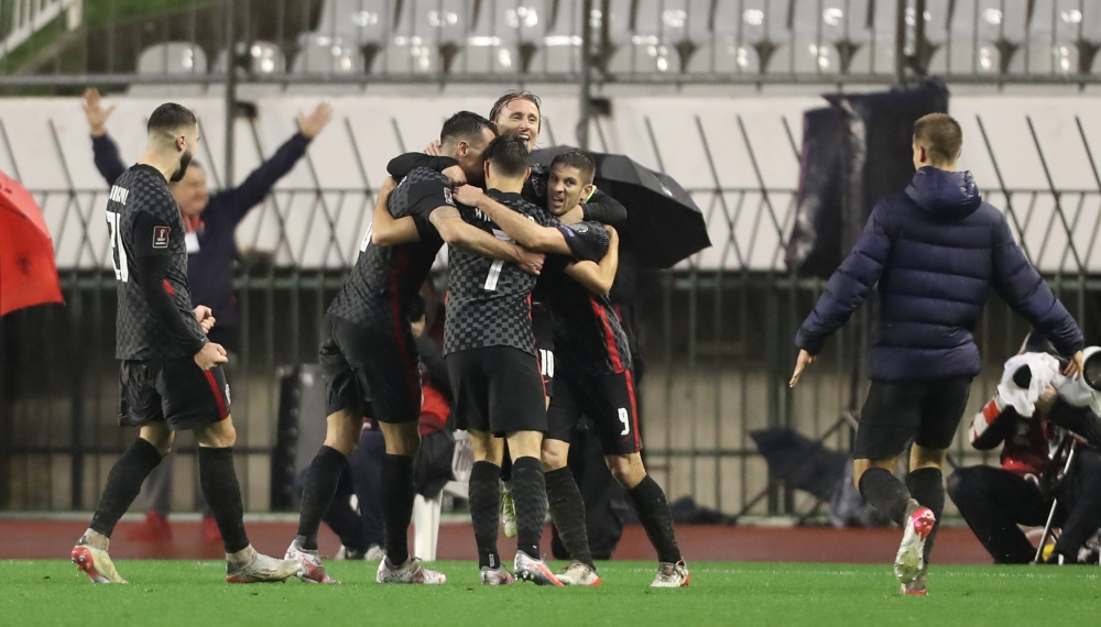 Croatia players celebrate their first goal an own goal scored by Russia's Fedor Kudryashov REUTERS/Antonio Bronic
