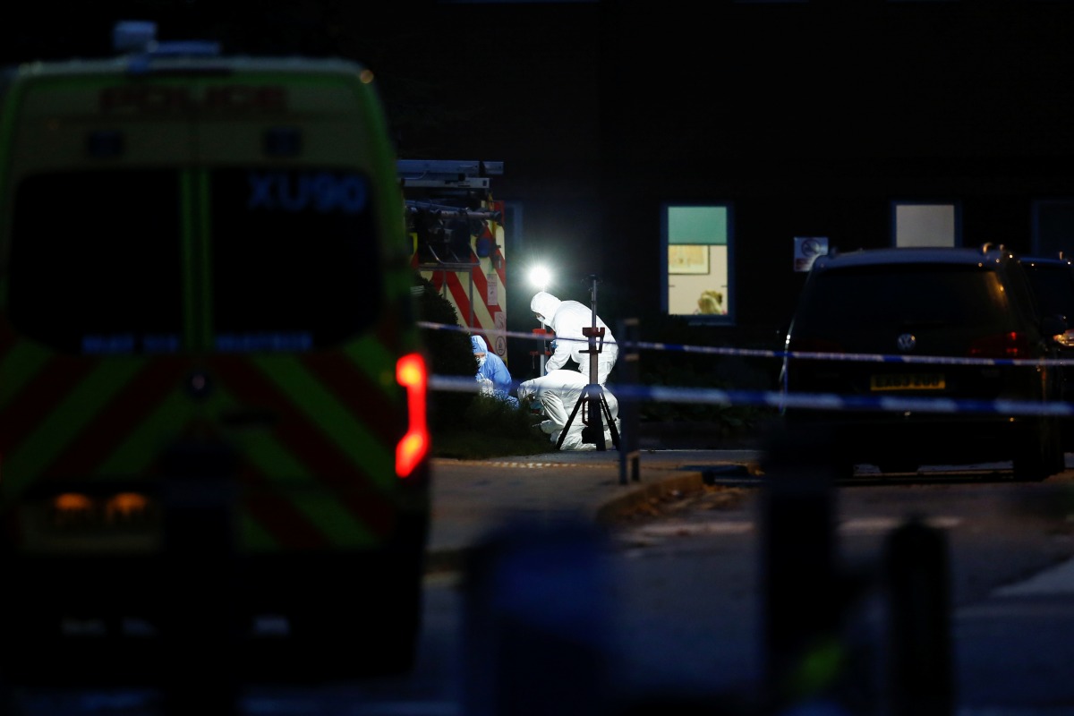 Forensic officers work outside Liverpool Women's Hospital, following a car blast, in Liverpool, Britain, November 15, 2021. REUTERS/Ed Sykes
