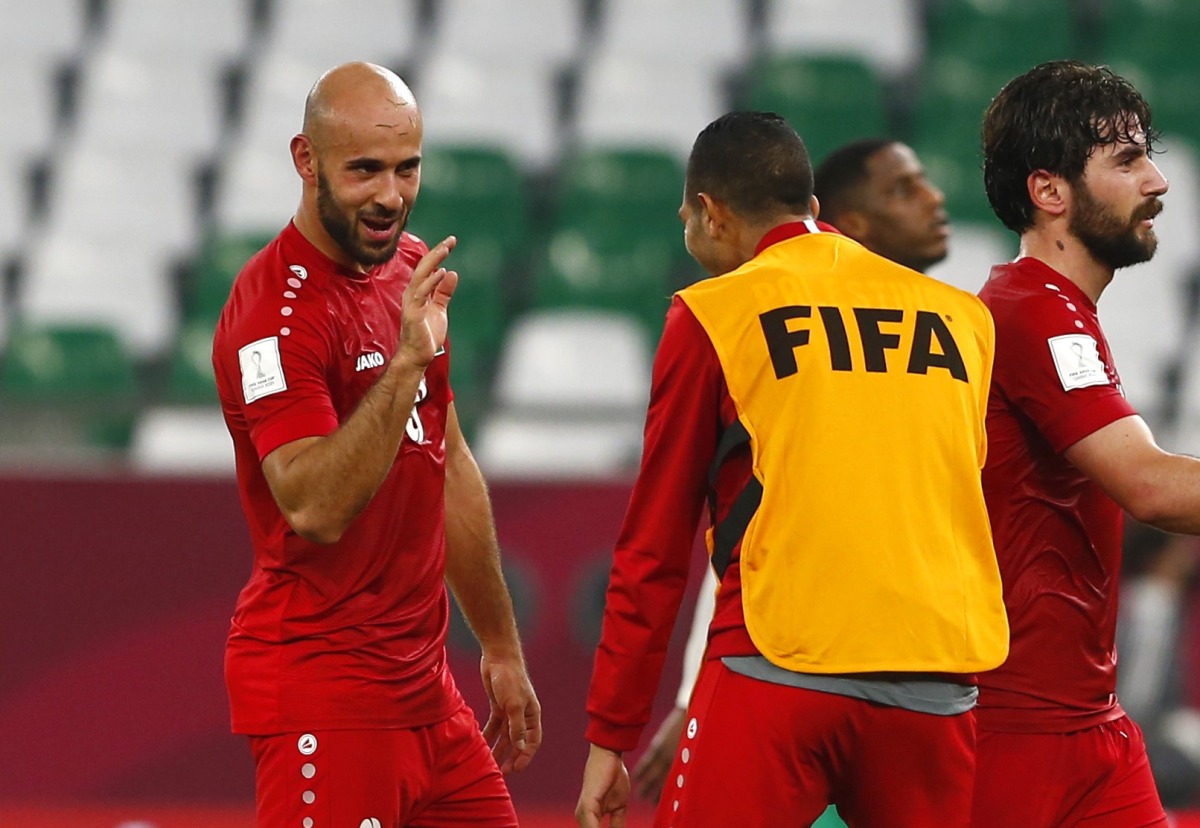 Palestine’s defensive midfielder Mohammed Rashid (left) gestures during the Group C match against Saudi Arabia.