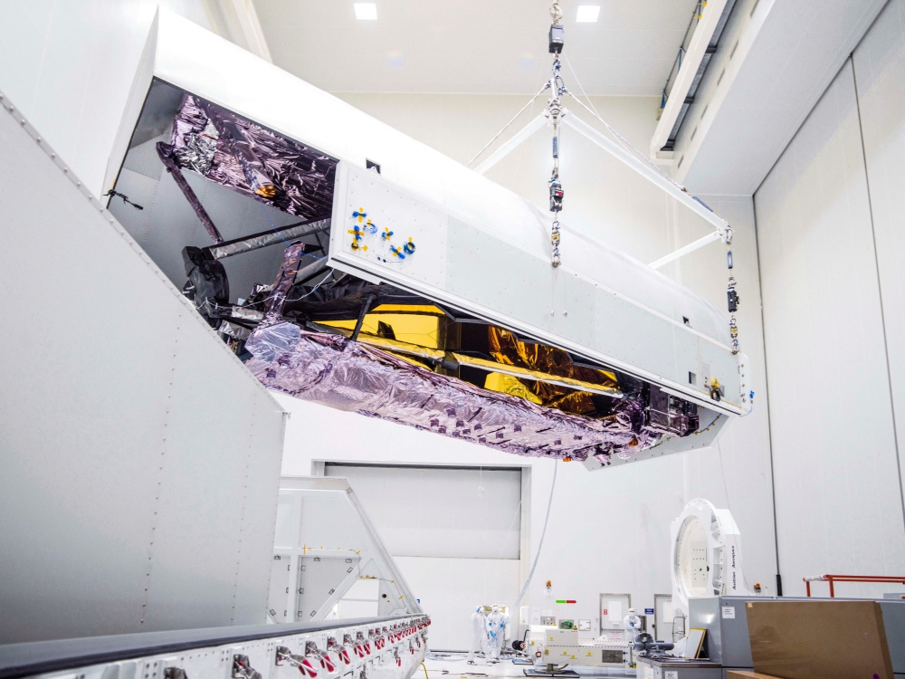 Engineers unpack, clean and prepare the James Webb Space Telescope ahead of its scheduled launch into orbit, upon its arrival at the launch site in Kourou, French Guiana, as seen in this NASA image released on November 2, 2021 and obtained by Reuters on December 13, 2021. NASA/Chris Gunn/Handout via REUTERS