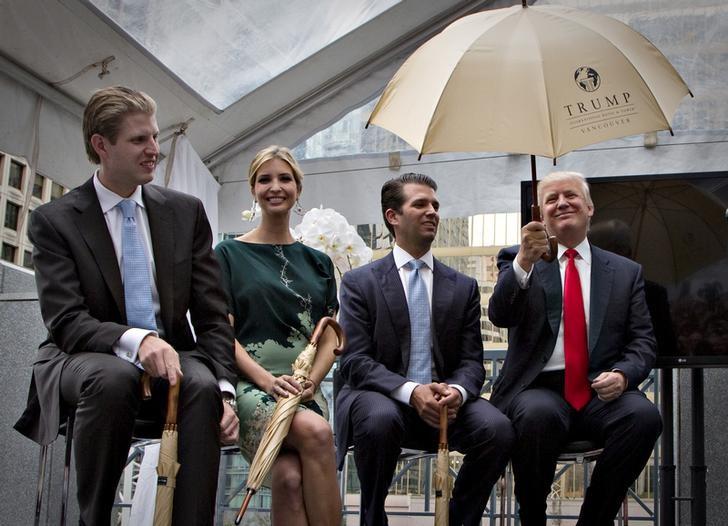 FILE PHOTO: Donald Trump (R) along with his children Eric (L), Ivanka (2nd L) and Donald Jr. attend a ceremony announcing a new hotel and condominium complex in Vancouver, British Columbia June 19, 2013. REUTERS/Andy Clark
