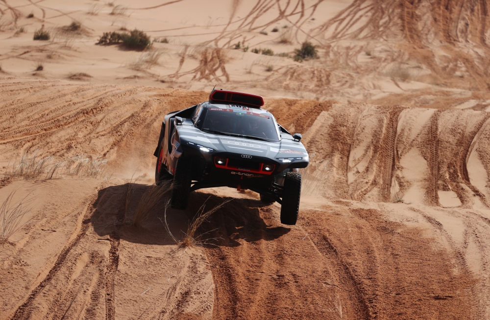 Team Audi Sport's Carlos Sainz and co-driver Lucas Cruz in action during stage 3 REUTERS/Hamad I Mohammed